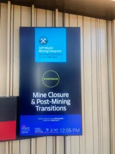 Digital sign saying 'Mine Closure and Post-Mine Transitions'