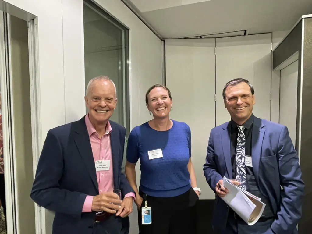 Dr Bruce Kelley, Rebecca Getty and Dr Guy Boggs at an event